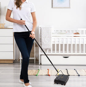 Fuller Brush 17052 cleaning under furniture; great for tight spaces.