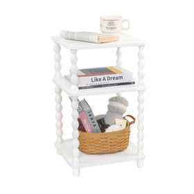 Fultyle end table top-tier surface with beverages and décor.