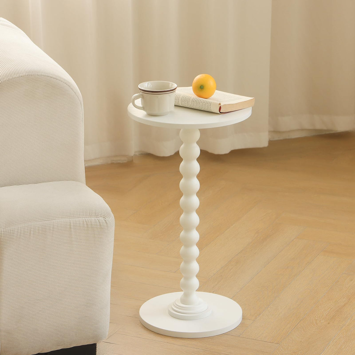 Fultyle white table with wood-ball connectors adds subtle stability.