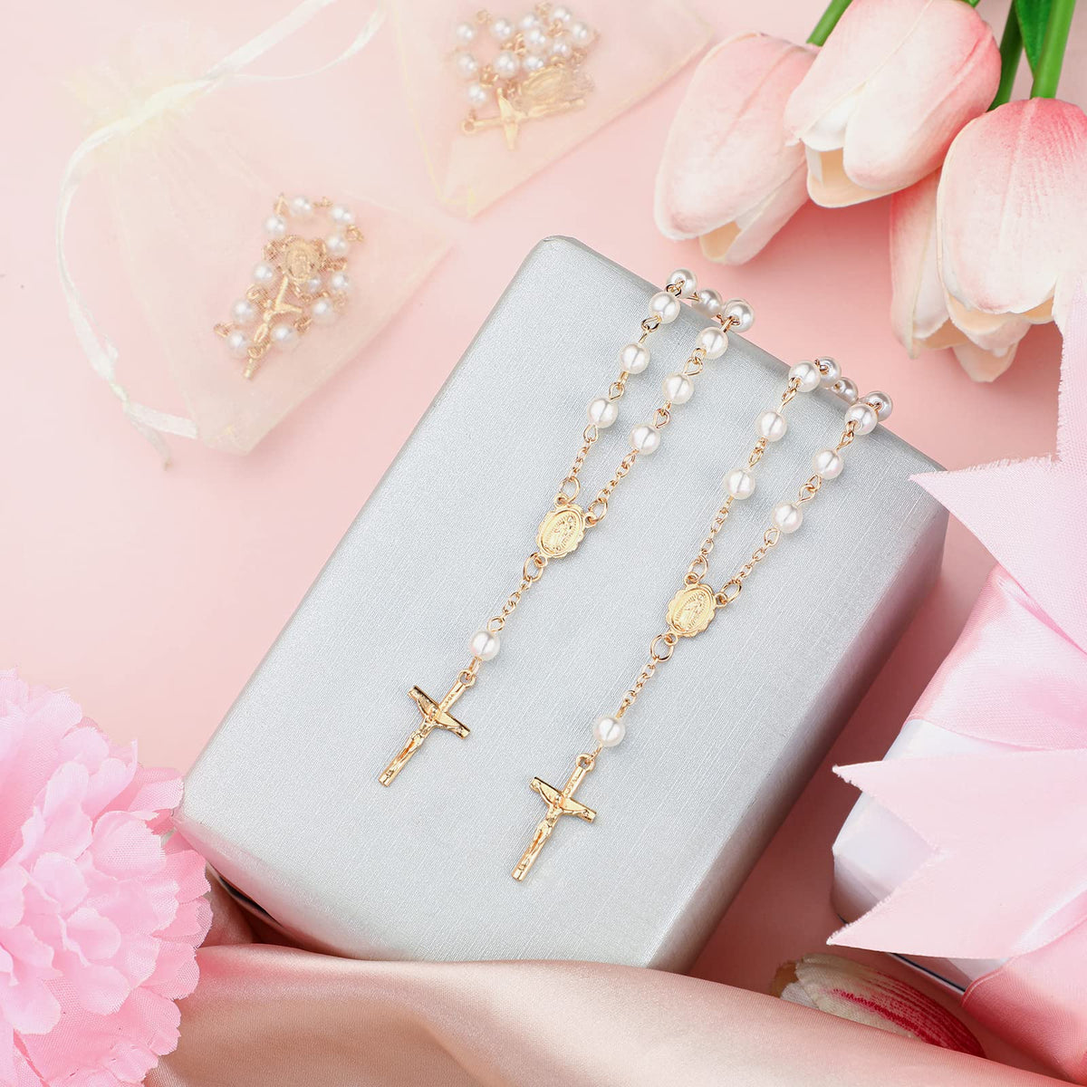 Fumete organza bag packaging complements the rosaries for gifting.