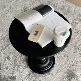Versatile accent table suitable for living rooms and porches