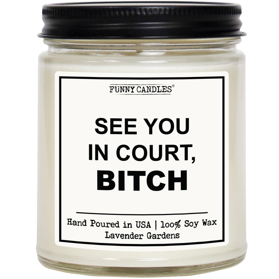 Funny Candles Lawyer Graduation Candle in a glass jar for celebration.
