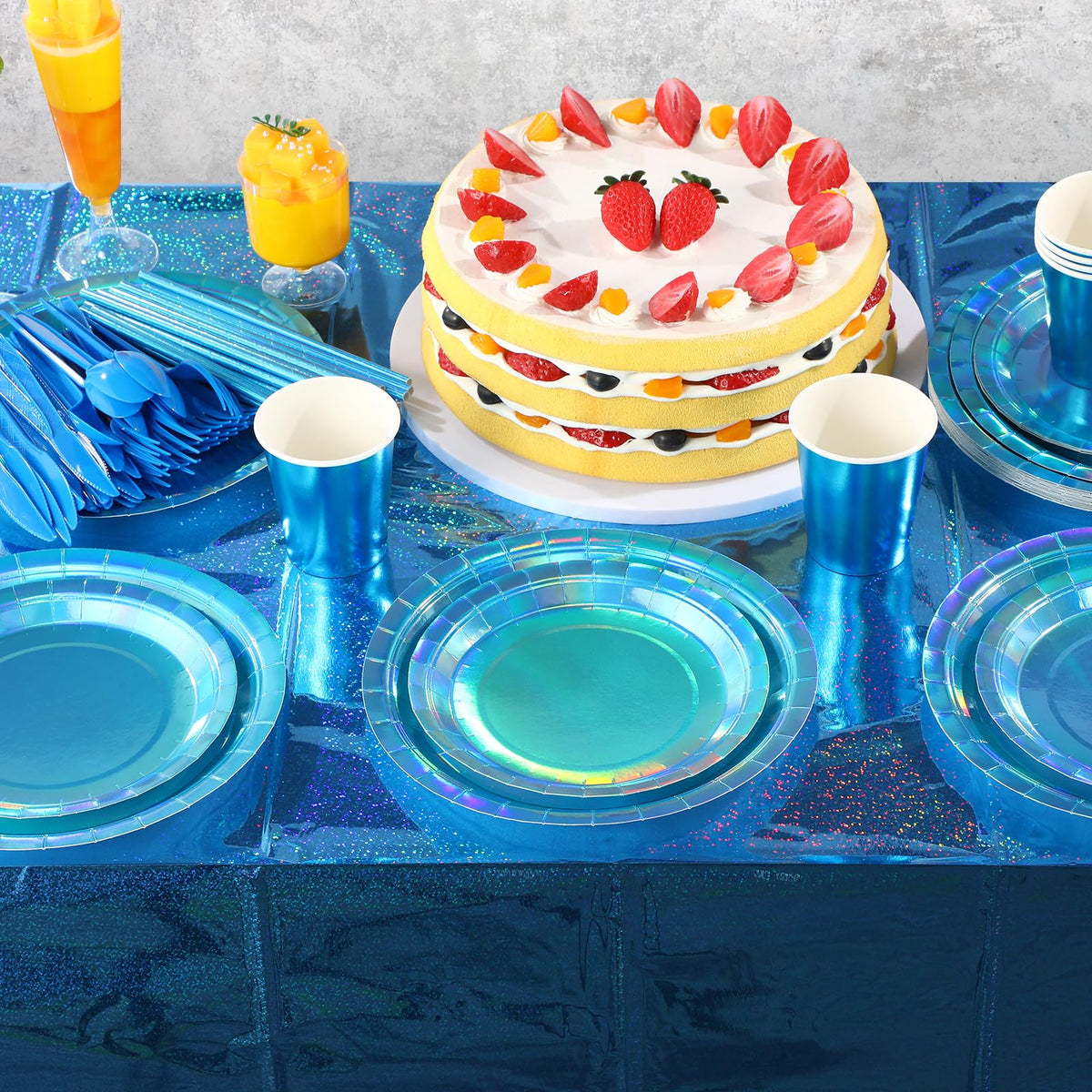 FunnyPars iridescent blue cutlery set completes the place setting.