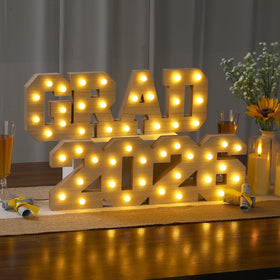 FunouHome graduation decor-table-sign creates a photo backdrop for graduates.