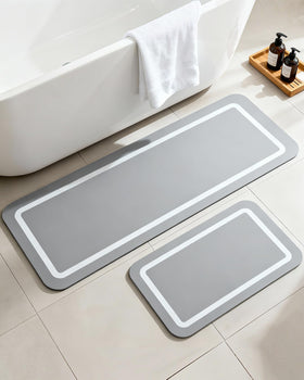 Furicher large soft diatomaceous-earth bath mat by shower exit for quick drying.