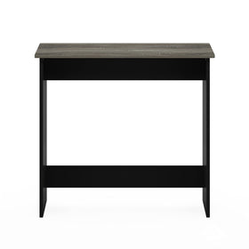 Furinno SIMPLISTIC small desk in dorm room setting demonstrates practical study space.