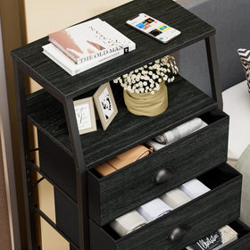 Furnulem dresser in entryway keeps keys and mail organized.