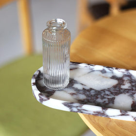 FutureStone Calacatta Viola tray with towels demonstrates compact decor