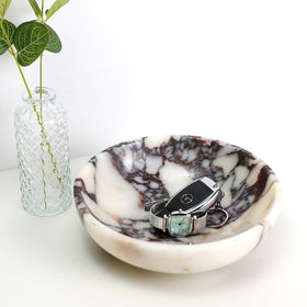 FutureStone marble bowl demonstrates handmade craftsmanship and natural veining.