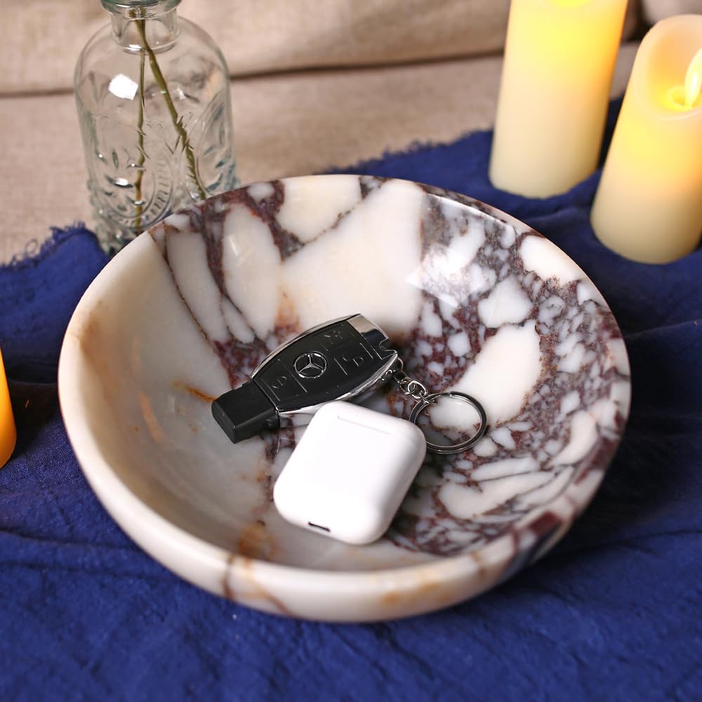 FutureStone marble bowl features non-slip base to protect furniture.