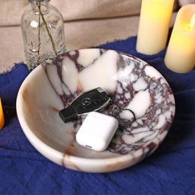 FutureStone marble bowl features non-slip base to protect furniture.