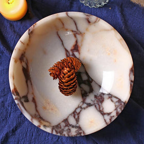 FutureStone marble bowl ideal for salads or desserts on dining table.