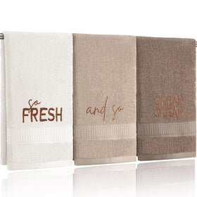 FuWeave farmhouse hand towel with So Fresh and So Clean embroidery for bathroom decor.