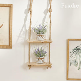 Fuxdre potted lavender accessory on living room mantel for balance.