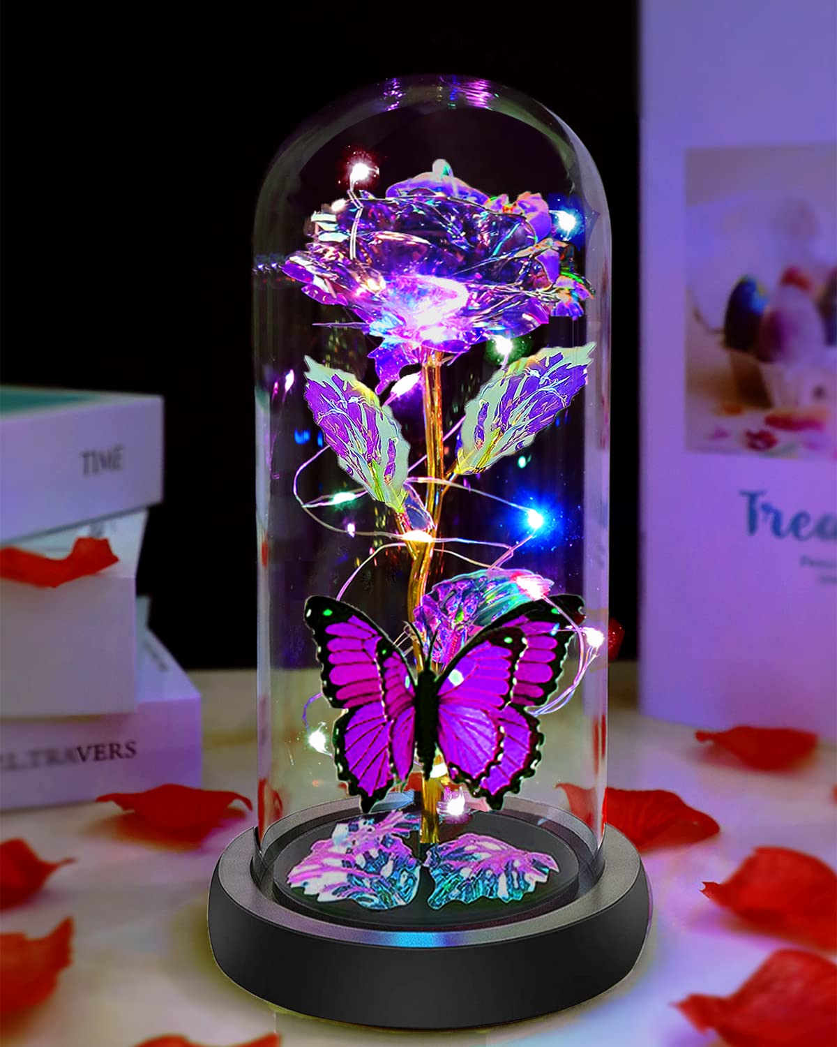 Fvawe butterfly colorful rose in glass dome with LED light for ambient decoration.