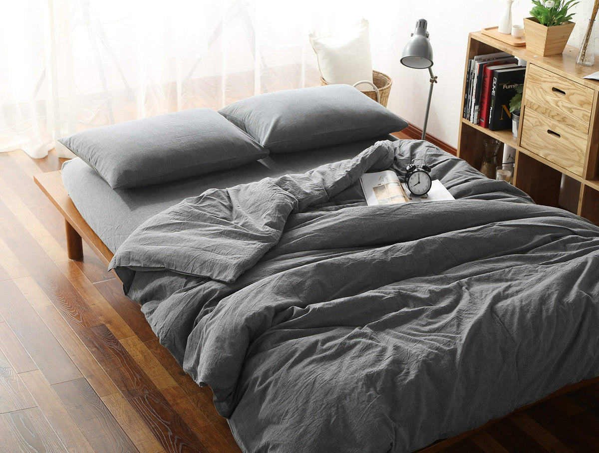 F.Y.Dreams washed cotton duvet cover in grey showing breathable fabric and softness.