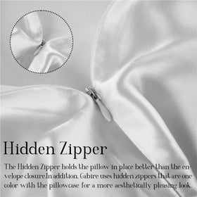Gabire silk pillowcase in white adds luxurious bedding touch.