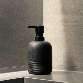 GalDal up-close reveals grain-textured surface on the dispenser