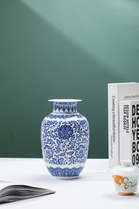 GaLouRo blue vase on the desk enhances workspace ambiance.