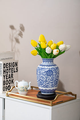 GaLouRo blue vase on a window sill adds timeless charm.