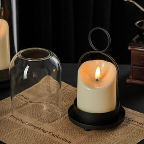 Ganwu table-ready hurricane decor shown with flowers and candlelight