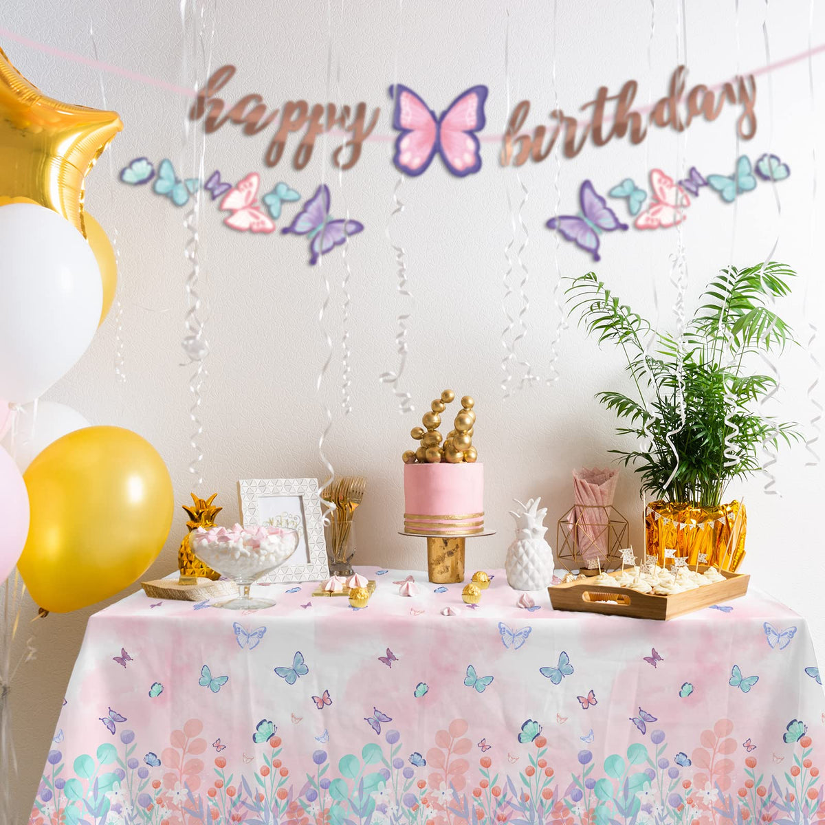 Gatherfun Butterfly banner greets guests and enhances the party theme