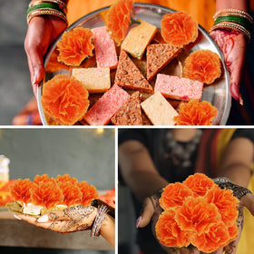 Geegoods orange marigold garland ideal for party backdrops and tables.