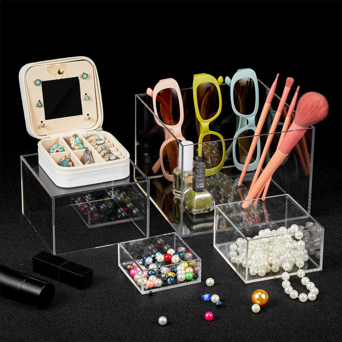 Geelin 6-pack acrylic risers stacked on a shelf for organized display.