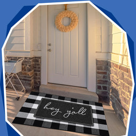 Geelin buffalo checkered rug—sturdy layered entryway decor for front porch.