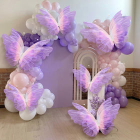Geelin pink-purple gradient butterfly decor brightening weddings and celebrations.