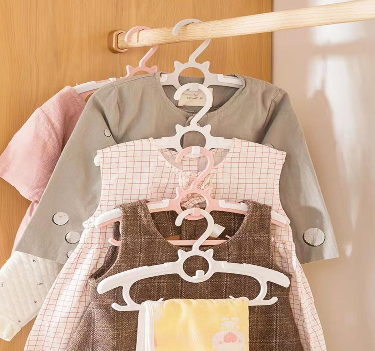 Gencuoir kids hangers with pants clips ideal for outfits.