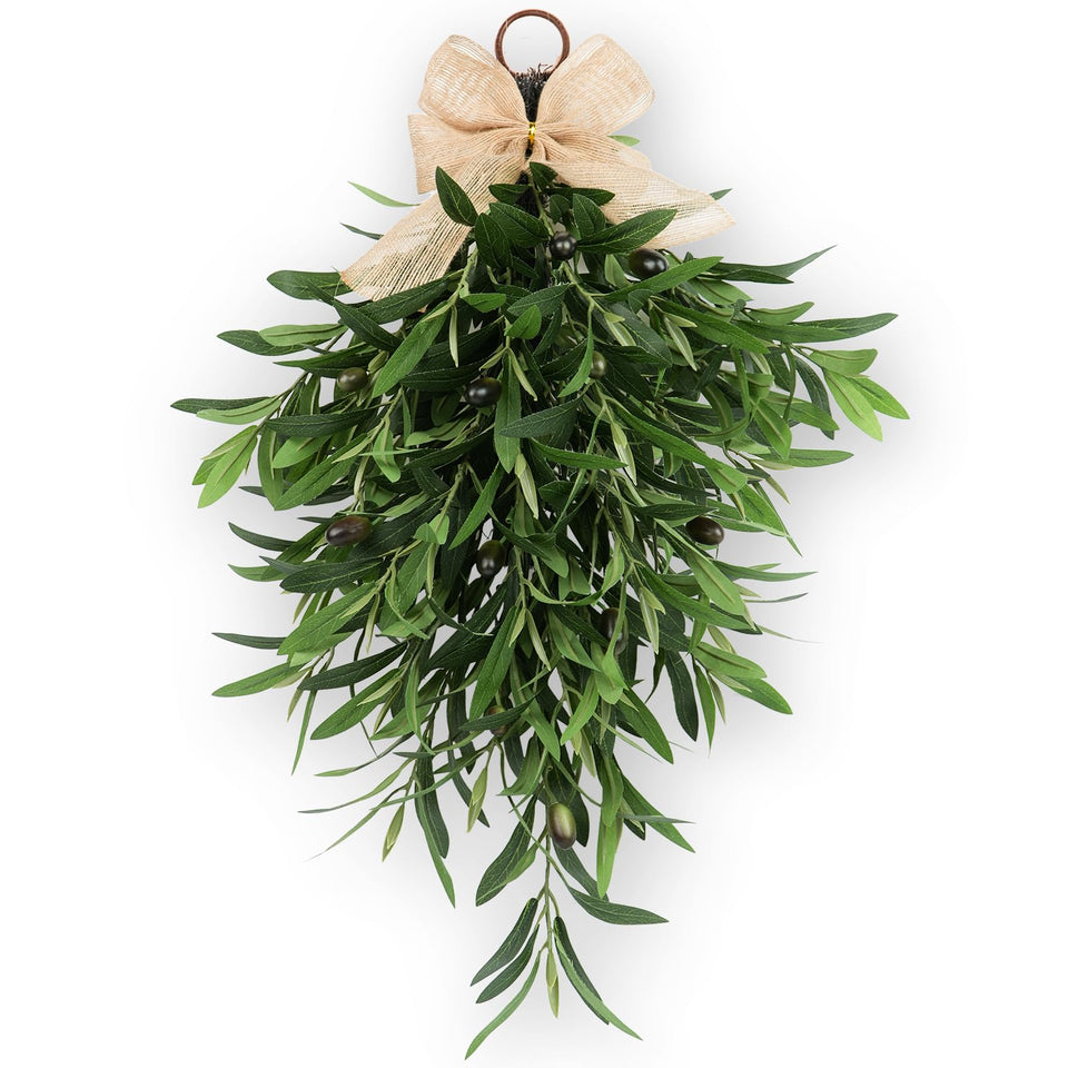 Generic olive teardrop swag on front door enhances curb appeal with Mediterranean charm