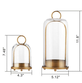 Generic brass-finish candle holder close-up, showing handmade glass and timeworn charm.