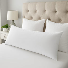 Generic rectangle pillow insert features a breathable shell for lasting comfort.