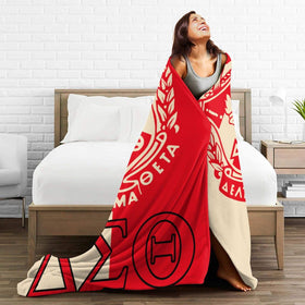 Generic Sorority Gifts Blanket folded on bed showing compact warmth