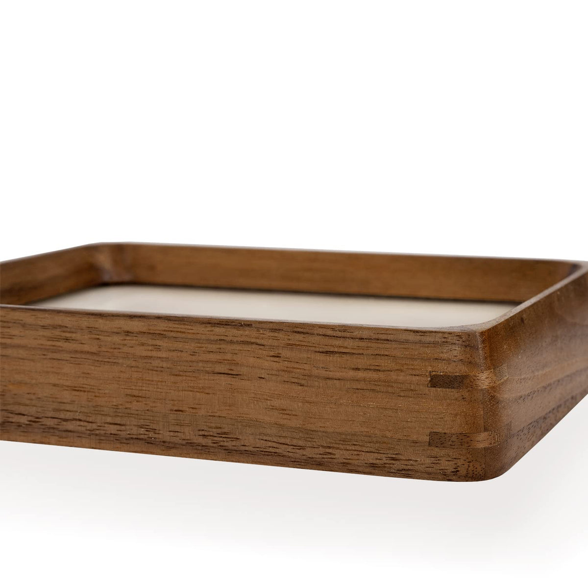Generic tabletop display in natural walnut complements living rooms.