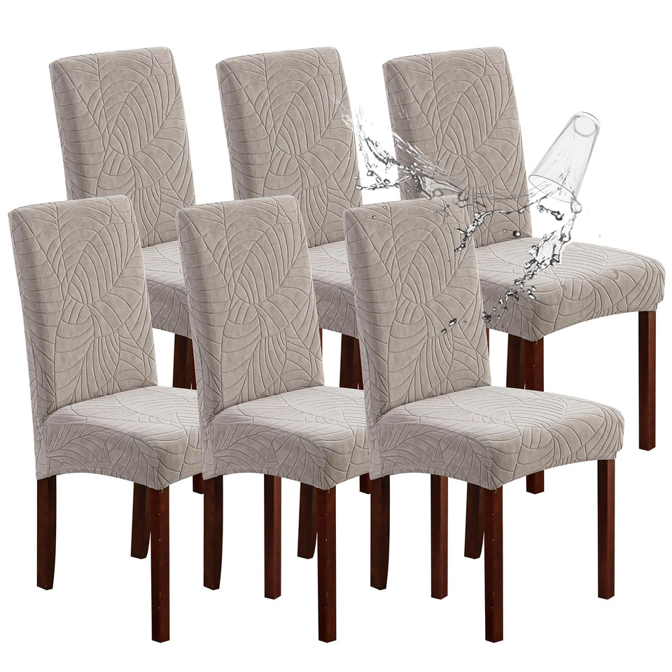 Genina waterproof chair cover Leaves-Warm Gray, front view, protects chairs from spills and stains.