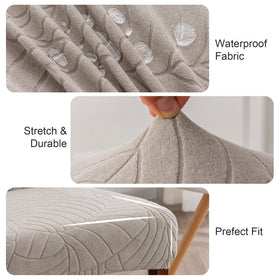 Genina stretch jacquard chair cover closeup, showing flexible fabric and decorative pattern.