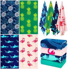 Genovega oversized towel with blue shark print for beach lounging