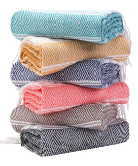 Genovega oversized Turkish beach towel provides full-body coverage at the beach.