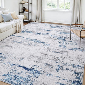 Gent drizz area rug with abstract design adds modern style to living spaces.