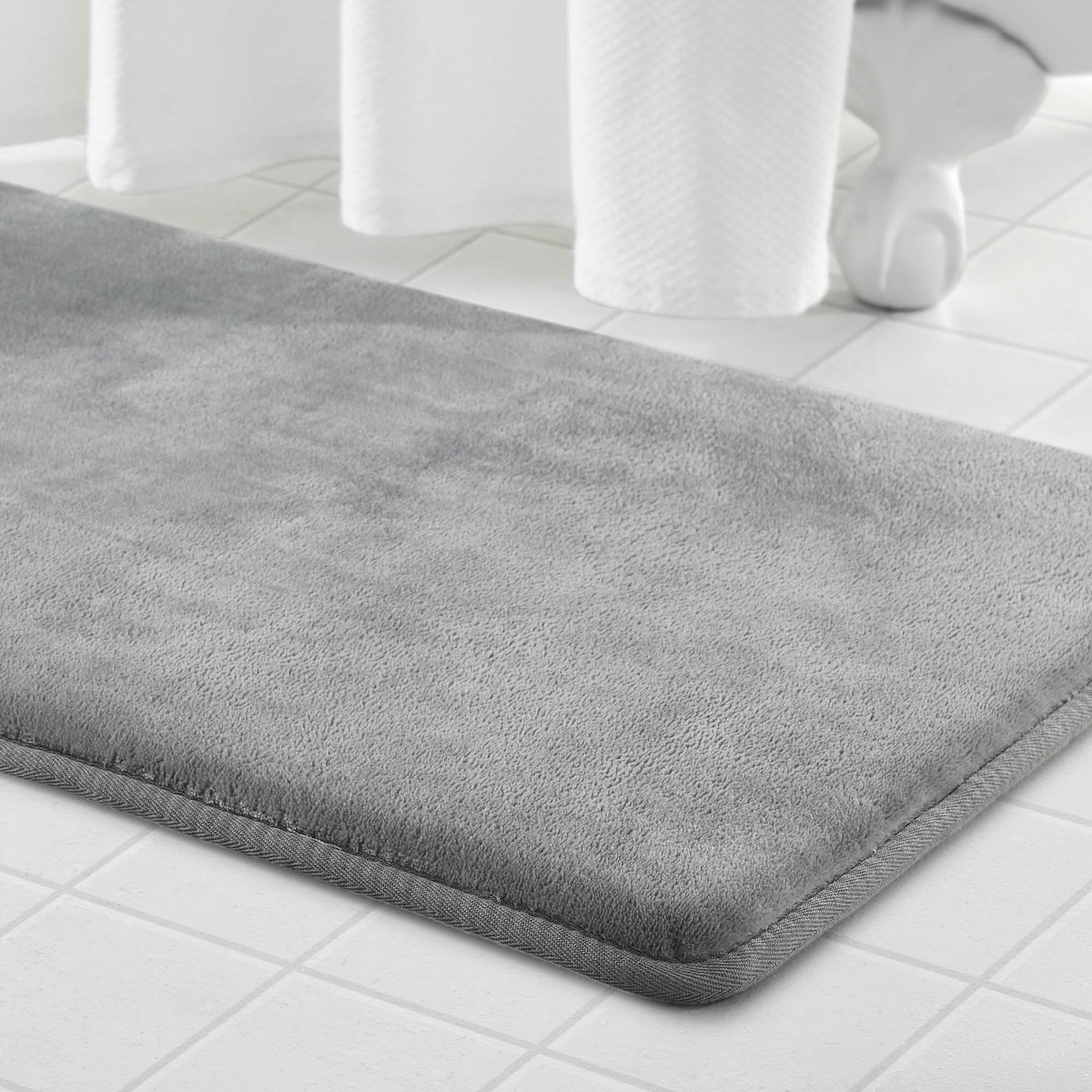 Genteele memory foam bath mat complements diverse decors with versatile color options.