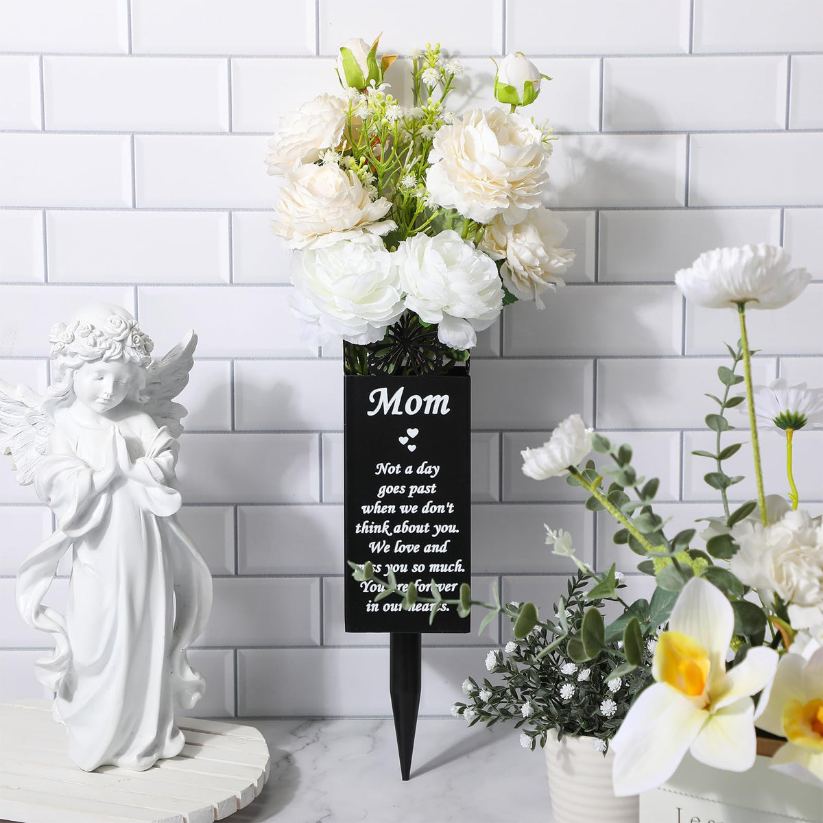 Geosar memorial vase with square base for flowers at gravesites.