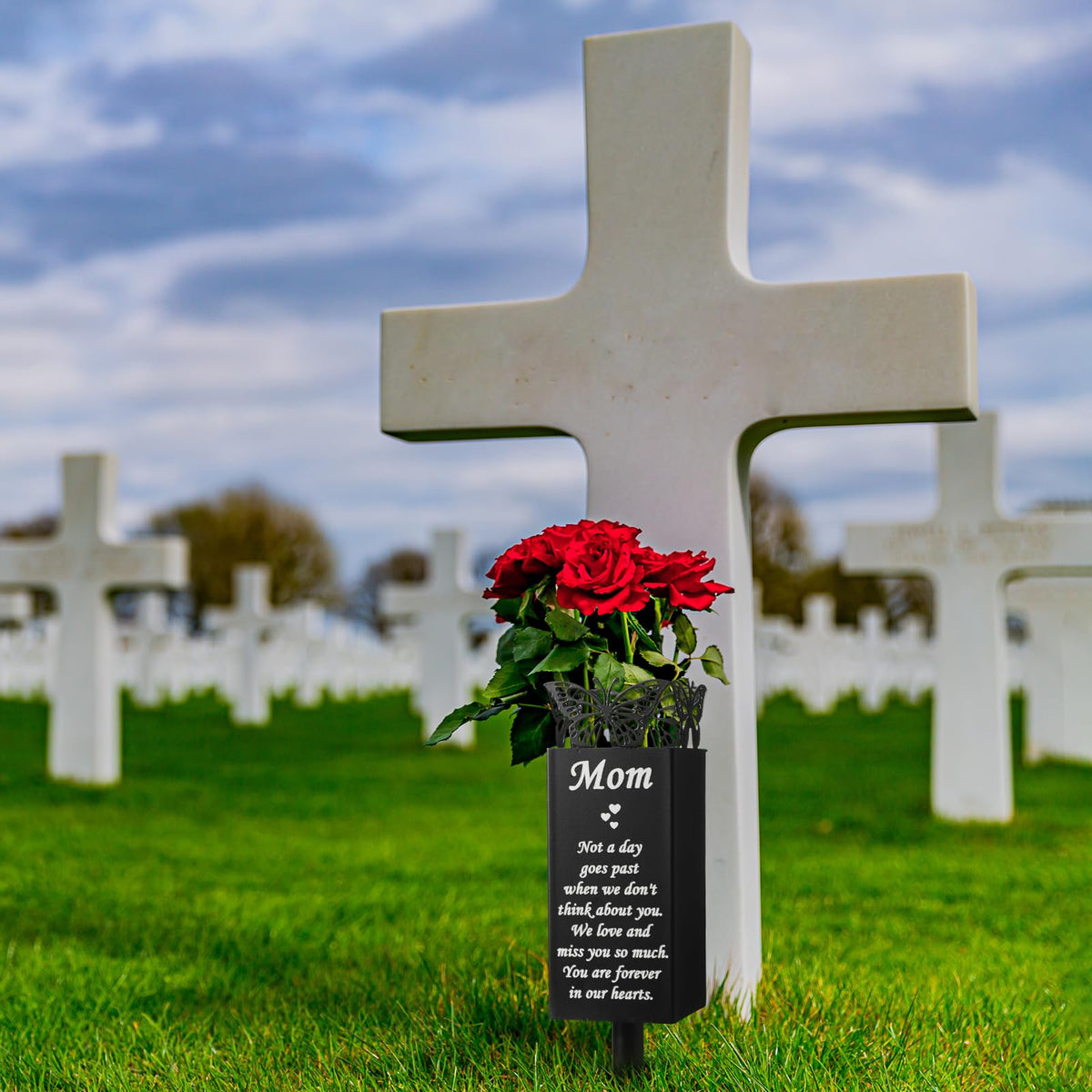 Geosar weather-resistant metal vase suitable for garden memorials and outdoor remembrance.