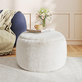 Gericco round foot-rest ottoman with plush foam for cozy living room relaxation.