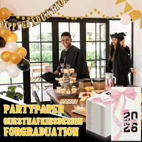 Gersoniel pink bow napkin detail adds a festive touch to graduation decor.
