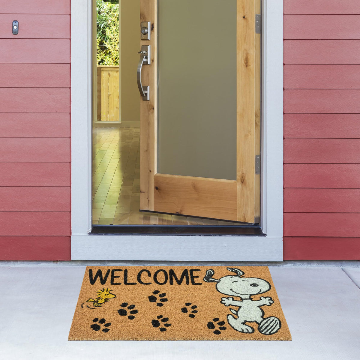 Gertmenian Peanuts Snoopy coir doormat durable construction for outdoor weather.