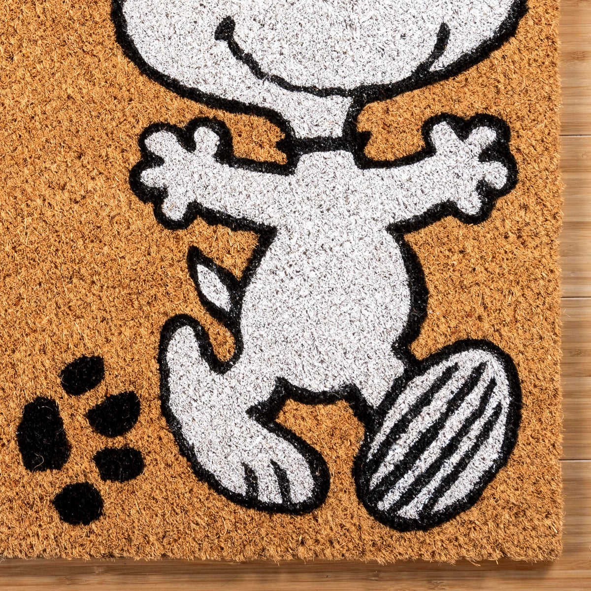 Gertmenian Peanuts Snoopy coir doormat for front door, welcoming guests with nostalgic charm.