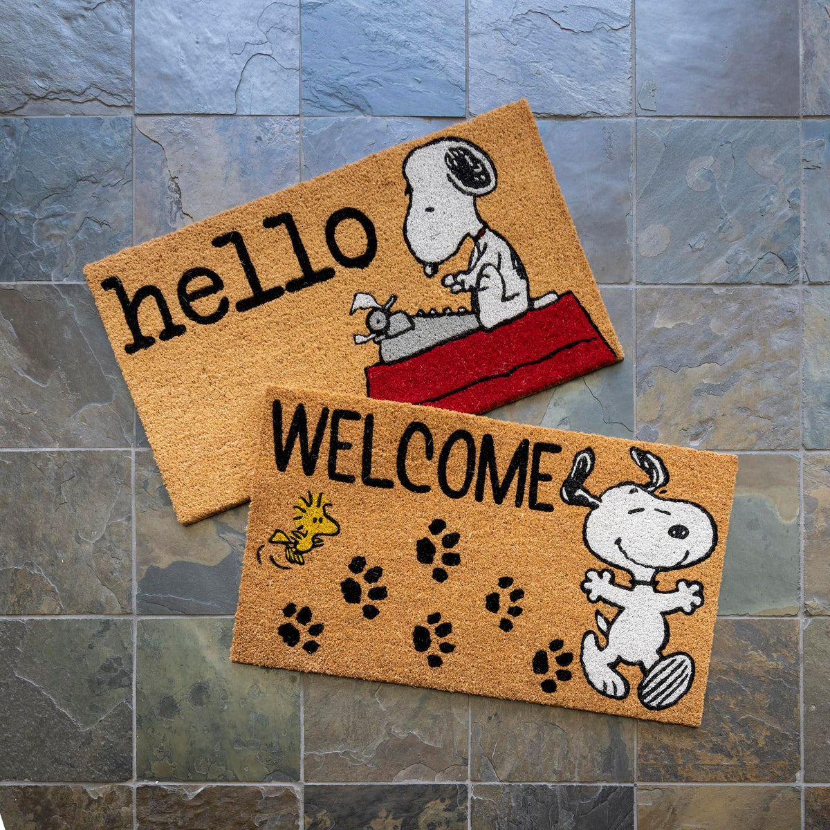 Gertmenian Snoopy coir doormat in living area, quick dirt scraping and moisture absorption.