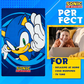 Get Trend Sonic throw blanket graphic design on kid's bed for bedtime comfort.